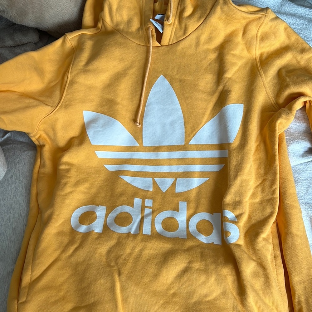 Yellow adidas hoodie in size medium